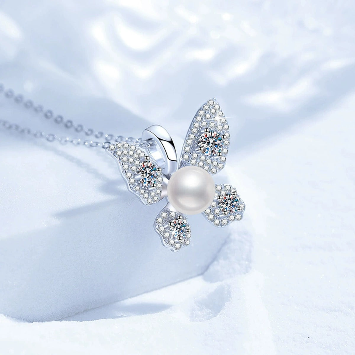 Butterfly Moissanite Freshwater Pearl Pendant Necklace with Cubic Zirconia in White Gold-Plated S925 Sterling Silver blue background product view