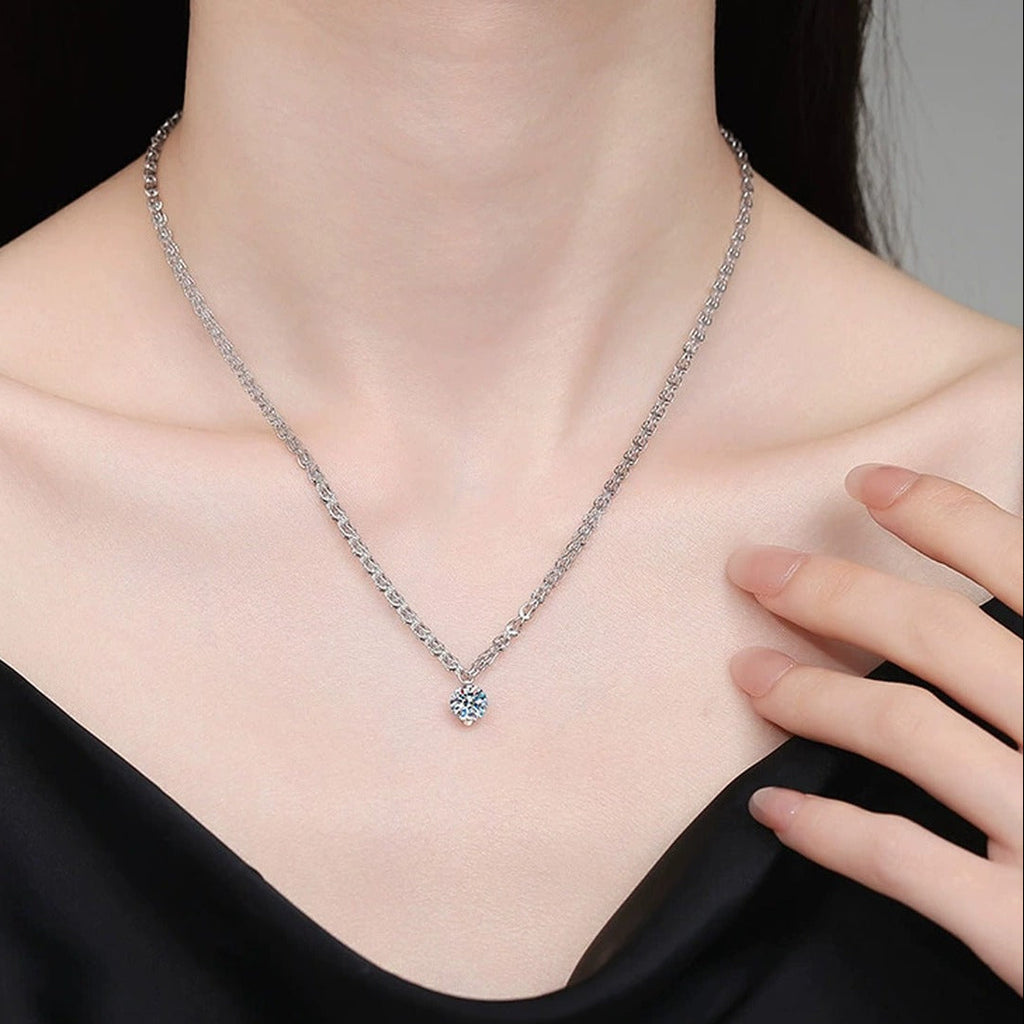 Round Moissanite Pendant Necklace in White Gold-Plated S925 Sterling Silver worn on neckline by model