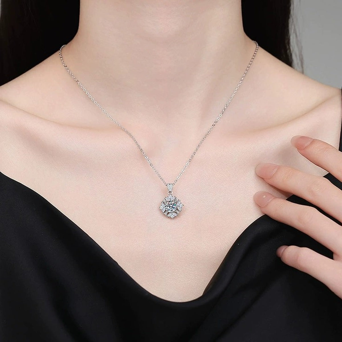 Floral Halo Moissanite Pendant Necklace with Cubic Zirconia in Platinum-Plated S925 Sterling Silver worn on neckline by model