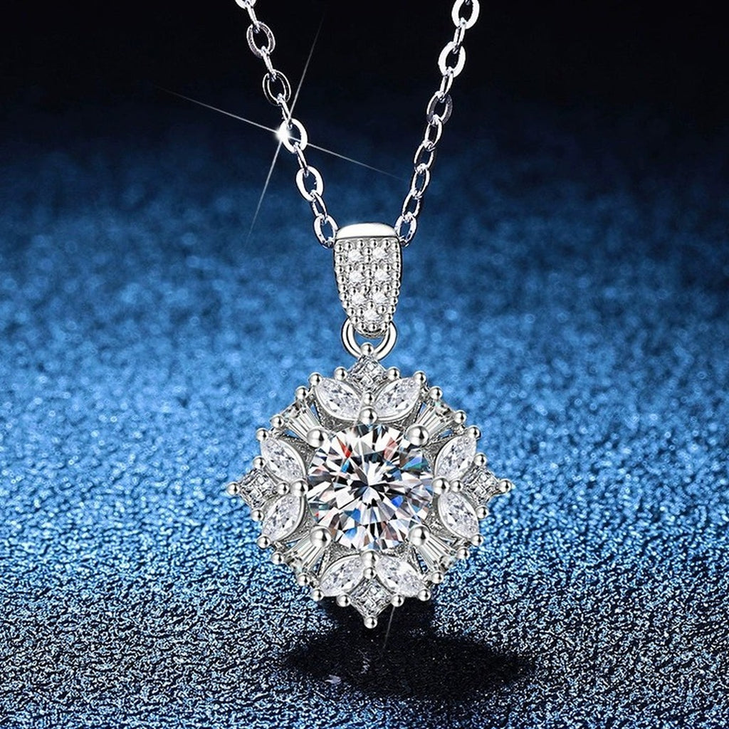 Floral Halo Moissanite Pendant Necklace with Cubic Zirconia in Platinum-Plated S925 Sterling Silver blue background angled view