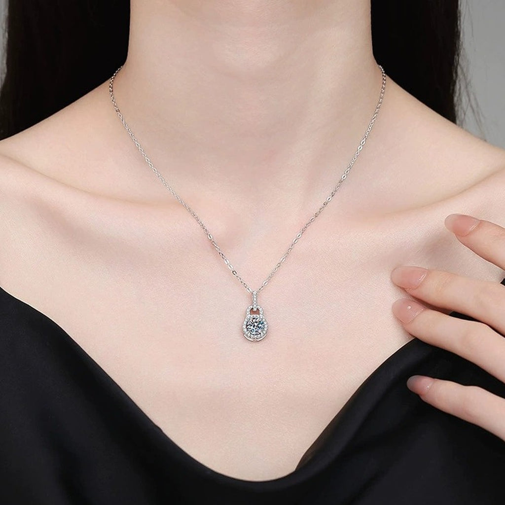 Oval Halo Moissanite Pendant Necklace with Cubic Zirconia in Platinum-Plated S925 Sterling Silver worn on neckline by model