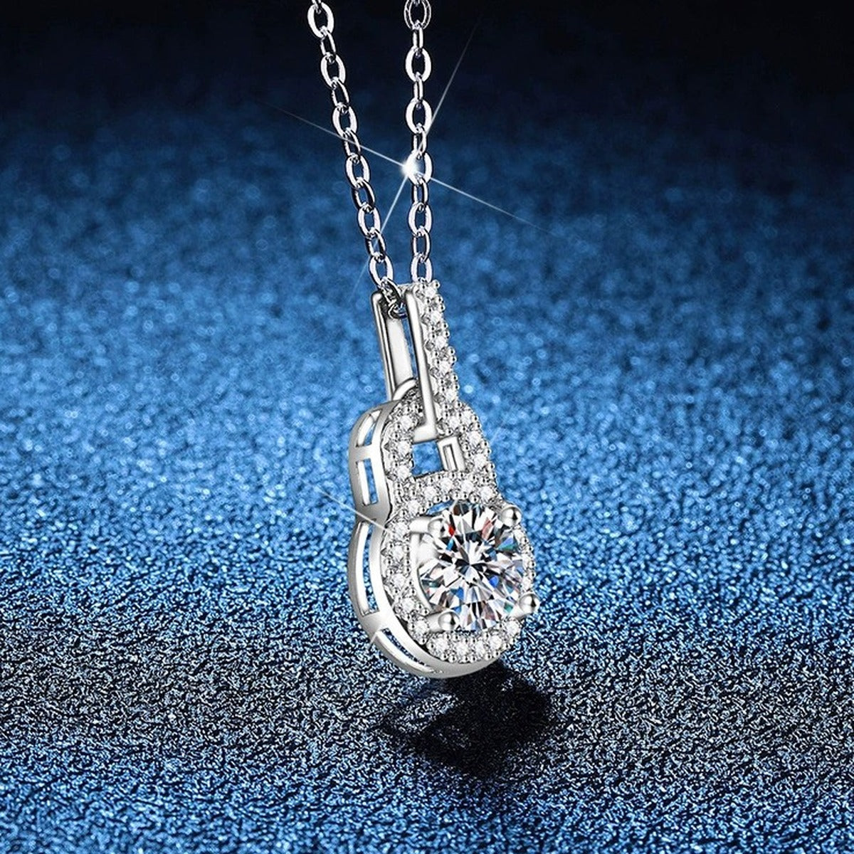 Oval Halo Moissanite Pendant Necklace with Cubic Zirconia in Platinum-Plated S925 Sterling Silver blue background close-up view