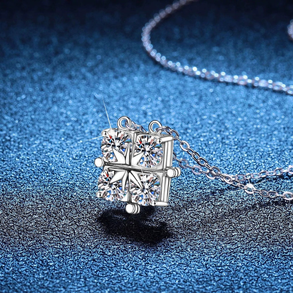 Geometric Four-Stone Moissanite Collar Necklace in Platinum-Plated S925 Sterling Silver blue background angled view