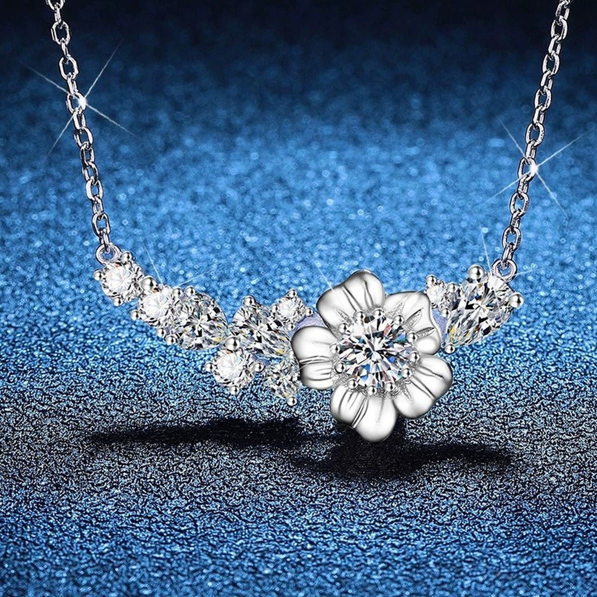 Floral Moissanite Collar Necklace with Cubic Zirconia in Platinum-Plated S925 Sterling Silver blue background close-up view