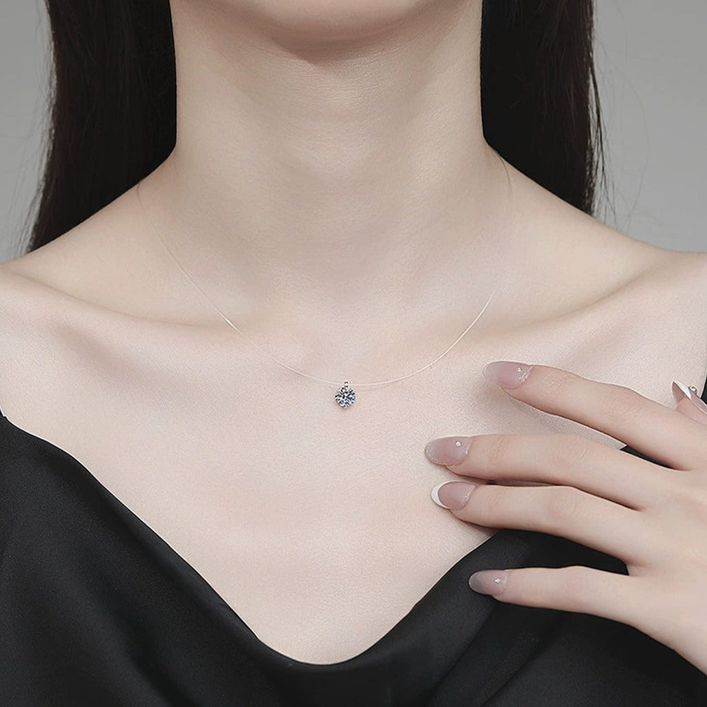 Round Moissanite Pendant Necklace in White Gold-Plated S925 Sterling Silver worn on neckline by model