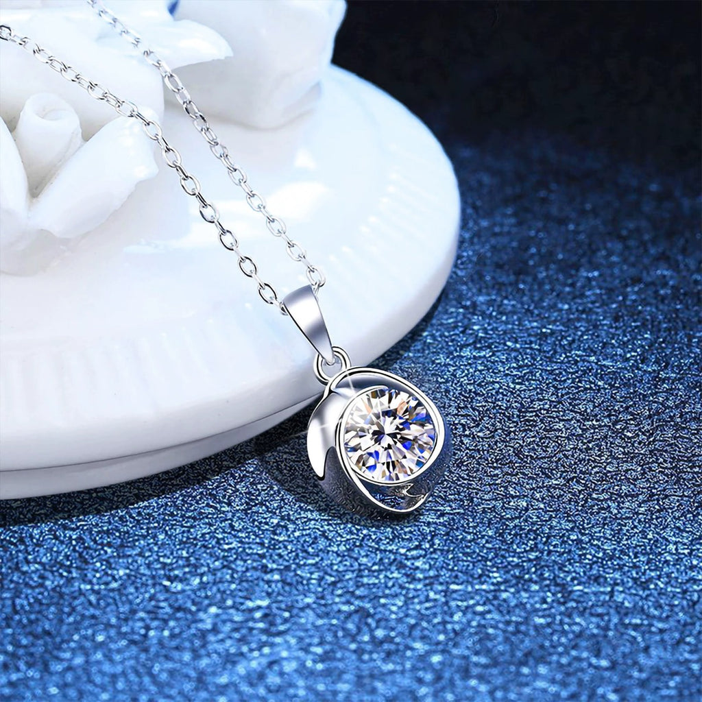 Round Swirl Moissanite Pendant Necklace in Platinum-Plated S925 Sterling Silver blue background close-up view