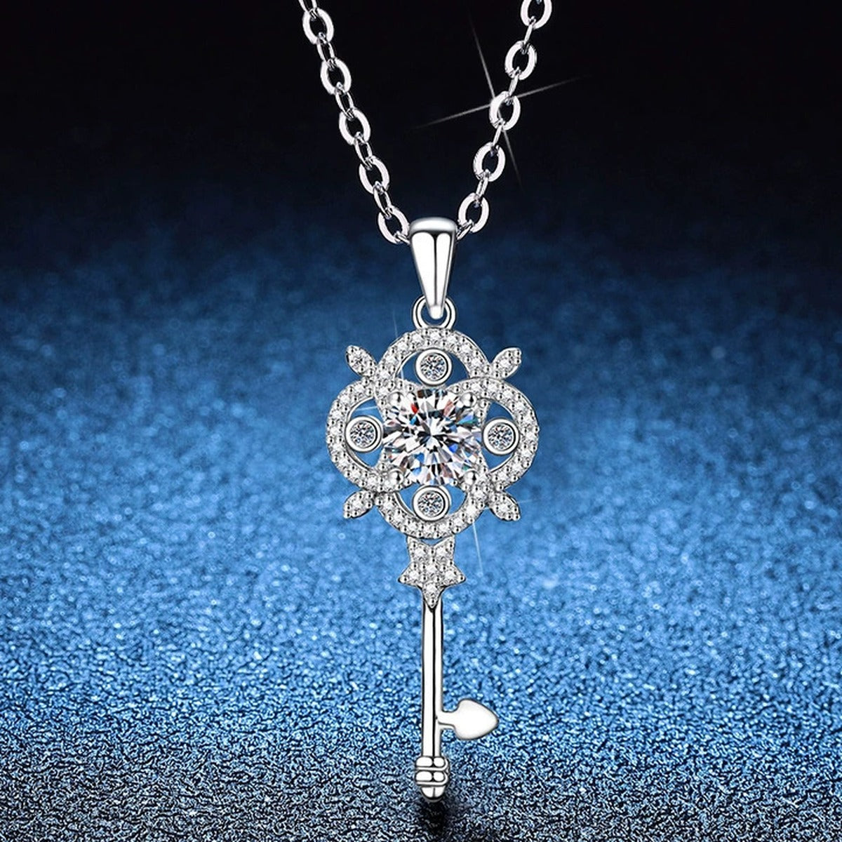 Ornate Key Moissanite Pendant Necklace with Cubic Zirconia in Platinum-Plated S925 Sterling Silver blue background product view