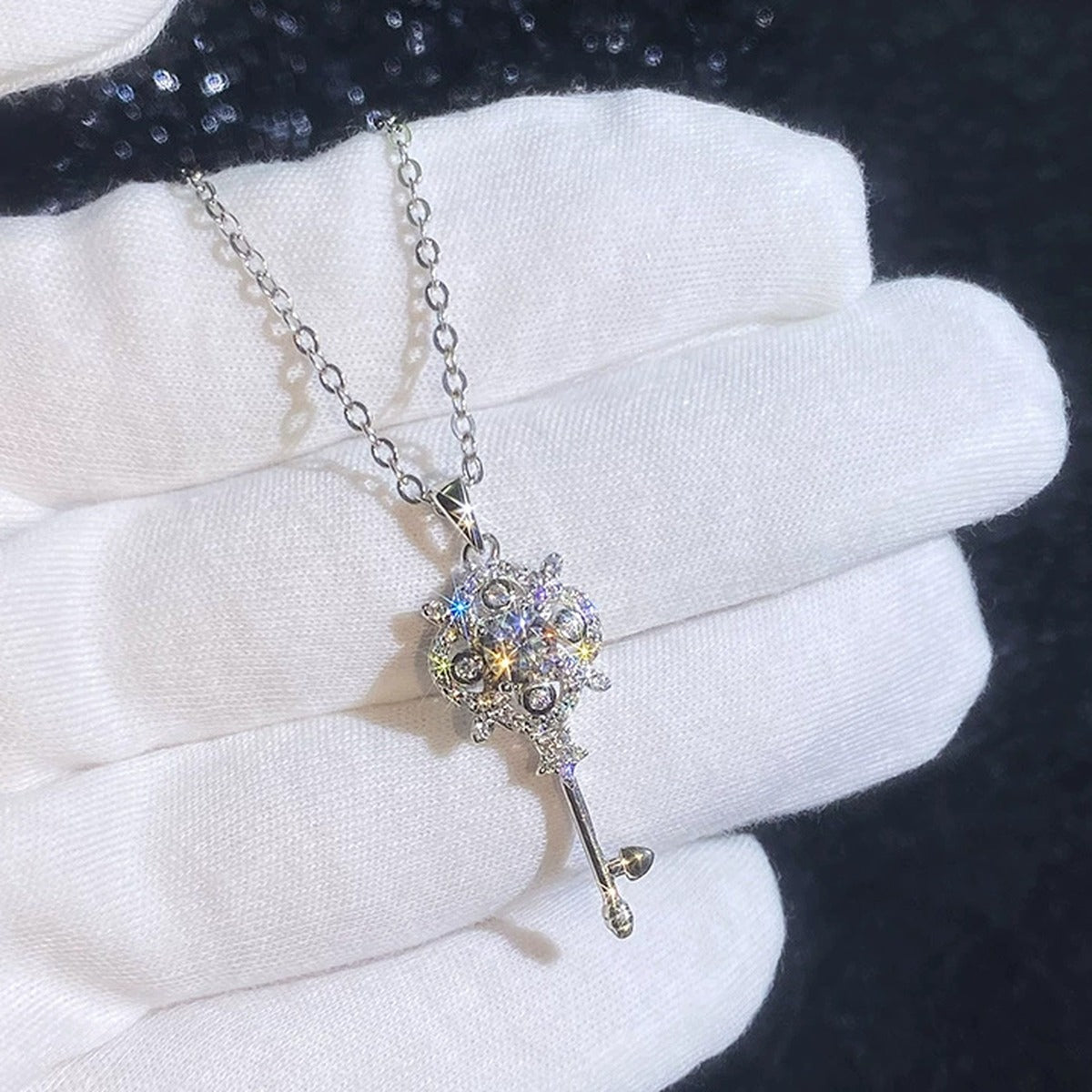Ornate Key Moissanite Pendant Necklace with Cubic Zirconia in Platinum-Plated S925 Sterling Silver close-up product detail view