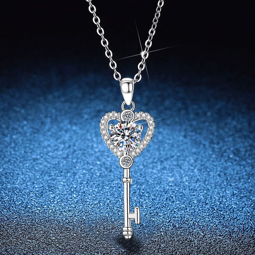 Heart Key Moissanite Pendant Necklace with Cubic Zirconia in Platinum-Plated S925 Sterling Silver blue background product view