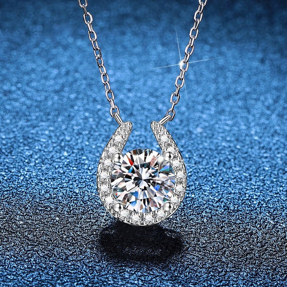 Pear Halo Moissanite Pendant Necklace with Cubic Zirconia in Platinum-Plated S925 Sterling Silver blue background product view