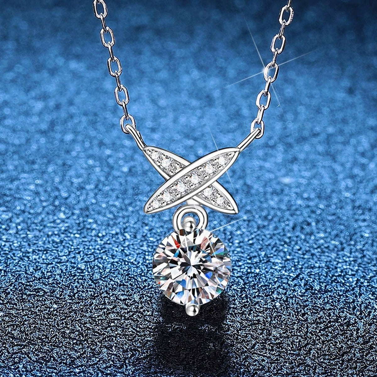 Ribbon Drop Moissanite Pendant Necklace with Cubic Zirconia in Platinum-Plated S925 Sterling Silver blue background product view