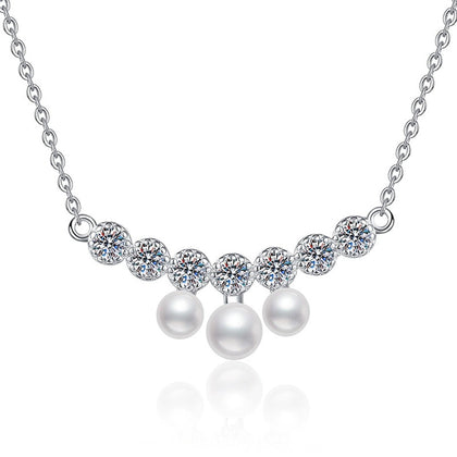 Graduated Freshwater Pearl Station Necklace in White Gold-Plated S925 Sterling Silver on clean white background showing the graduated pearl station necklace with small freshwater pearls