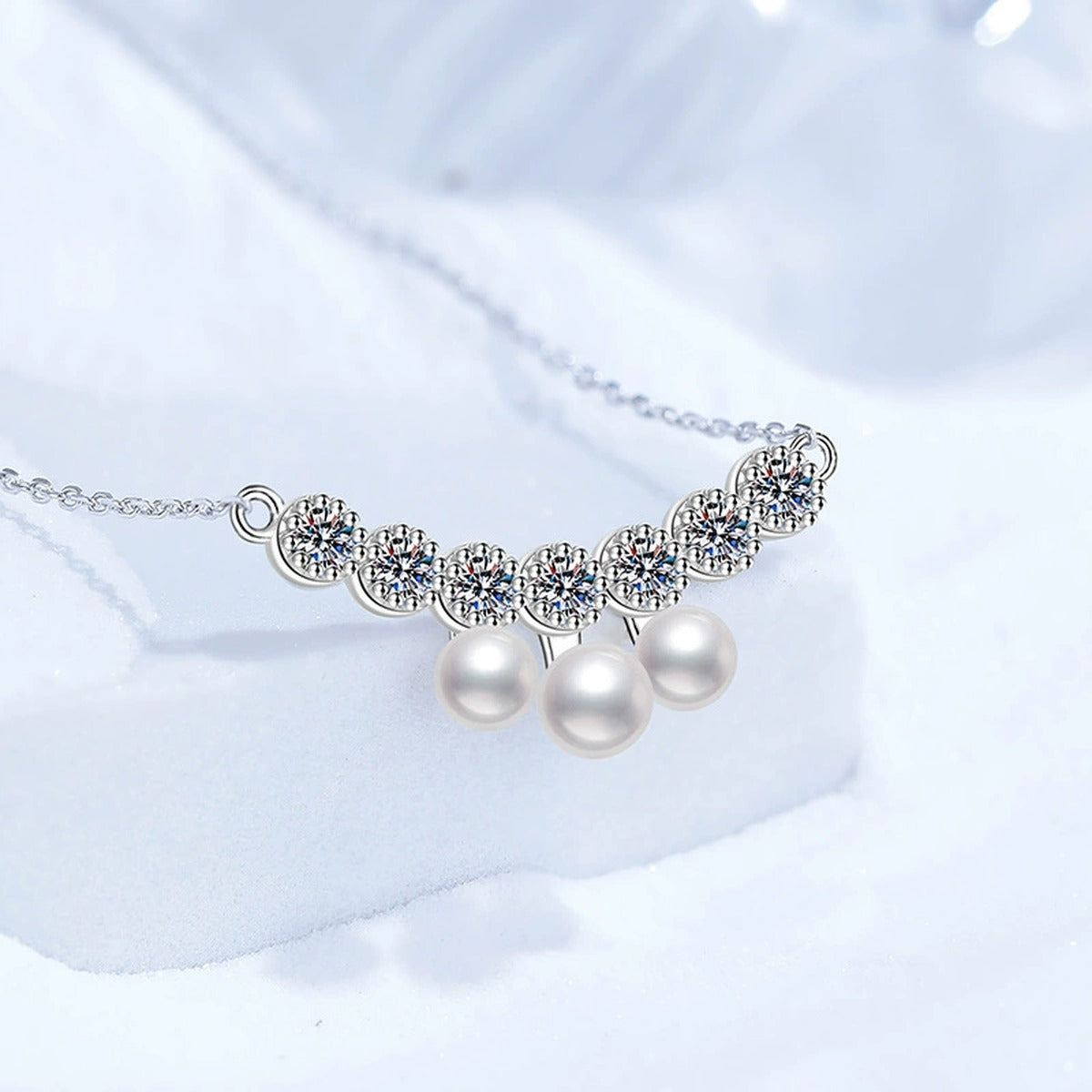 Graduated Freshwater Pearl Station Necklace in White Gold-Plated S925 Sterling Silver close-up product detail view