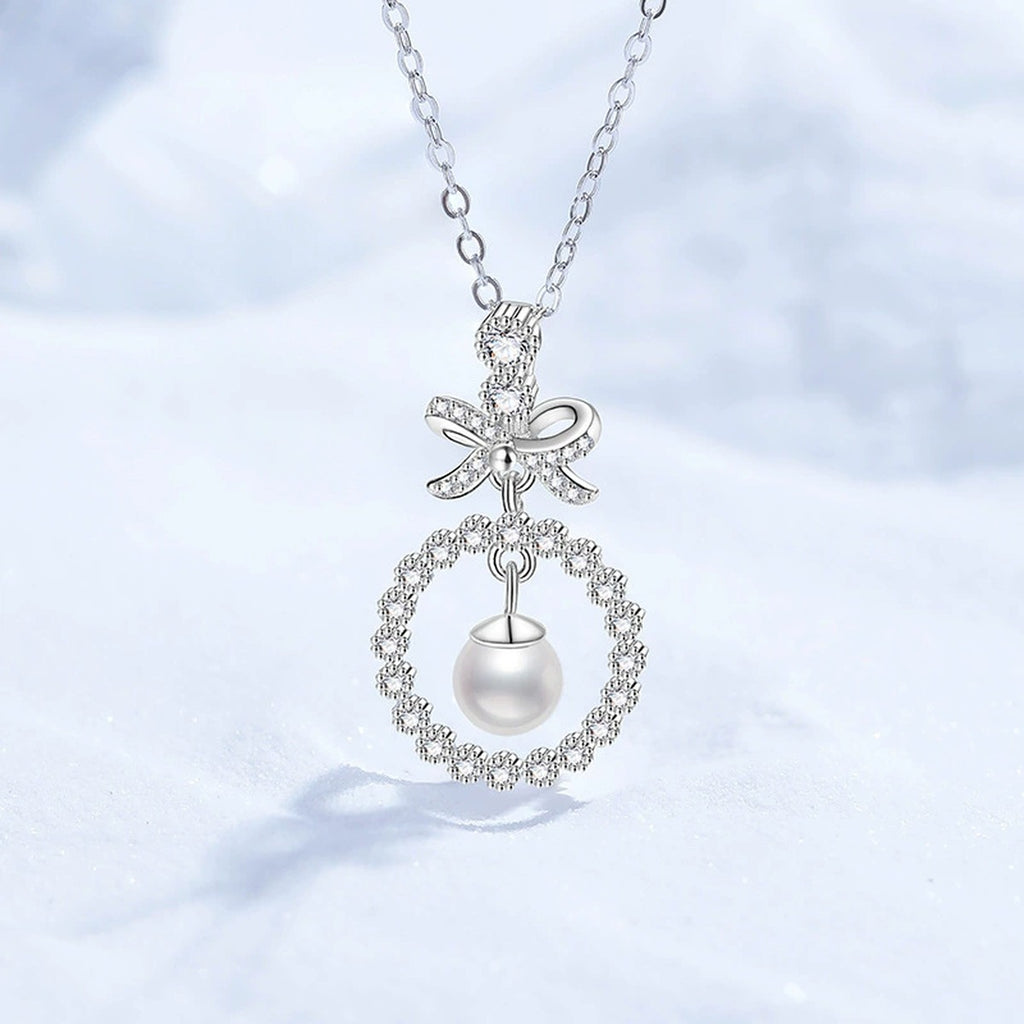 Bow Moissanite Freshwater Pearl Pendant Necklace with Cubic Zirconia in White Gold-Plated S925 Sterling Silver close-up product detail view