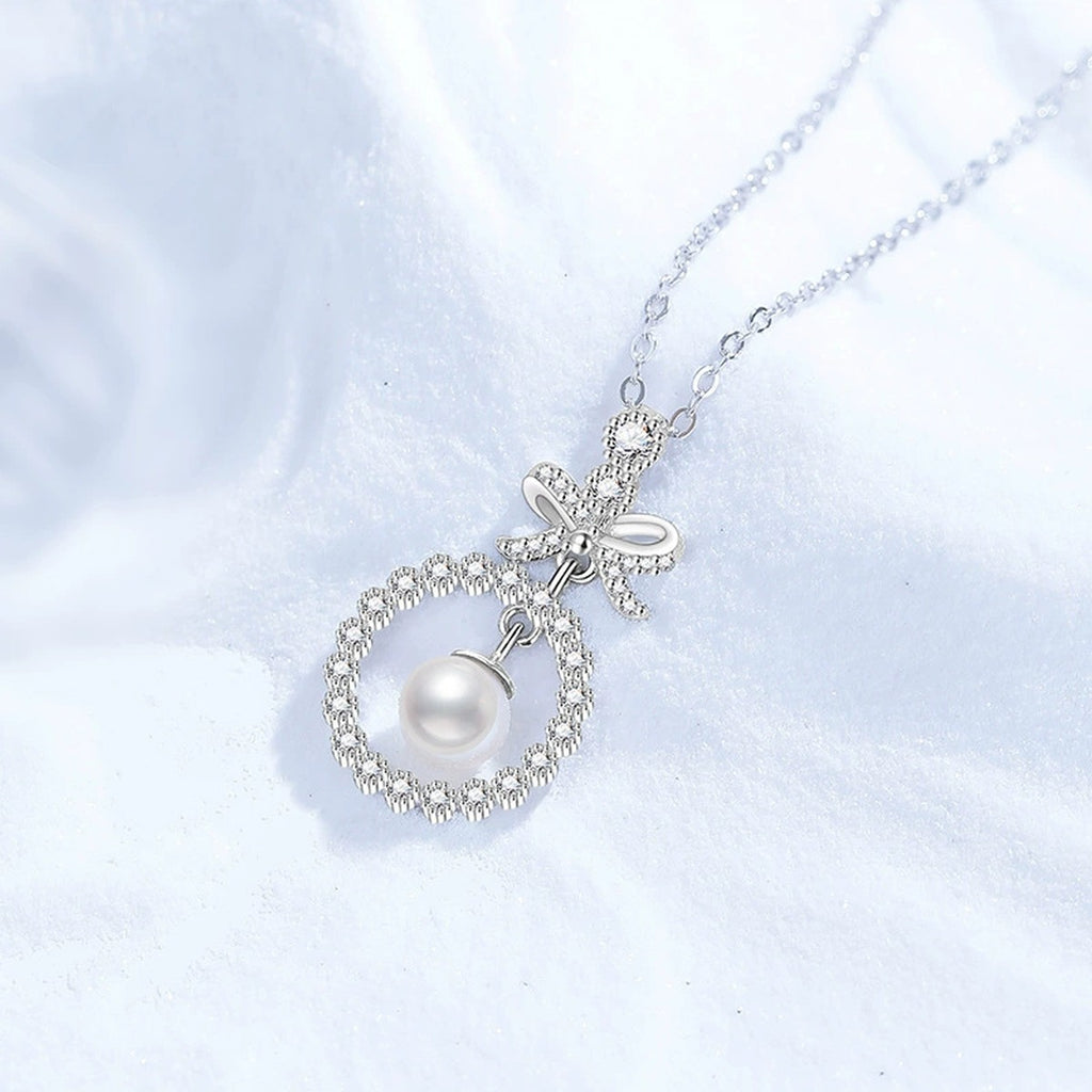 Bow Moissanite Freshwater Pearl Pendant Necklace with Cubic Zirconia in White Gold-Plated S925 Sterling Silver close-up product detail view