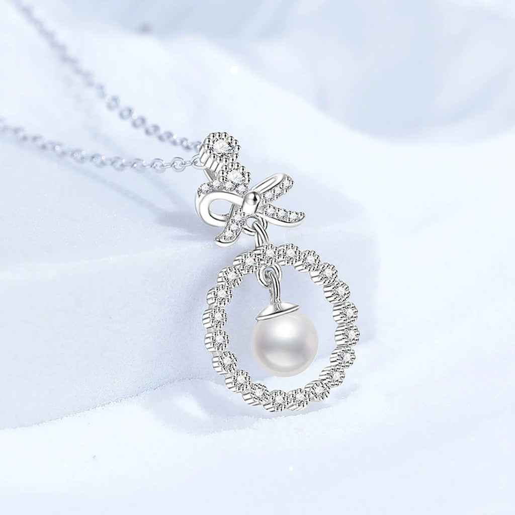 Bow Moissanite Freshwater Pearl Pendant Necklace with Cubic Zirconia in White Gold-Plated S925 Sterling Silver close-up product detail view