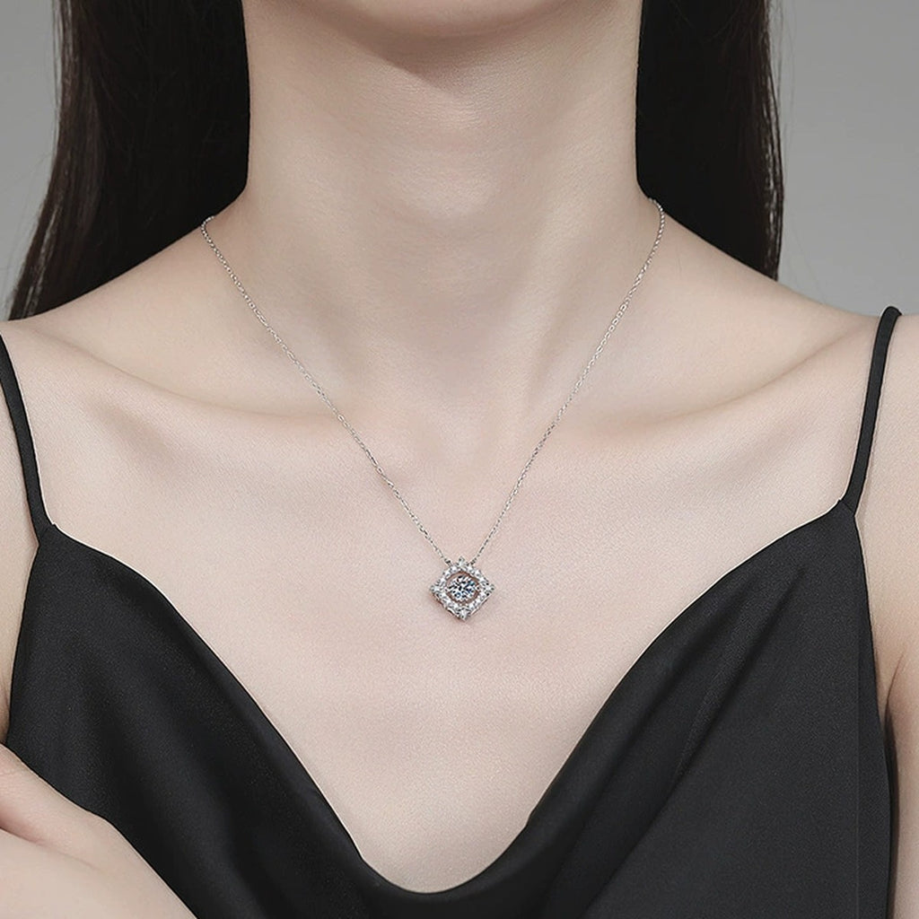 Round Halo Moissanite Pendant Necklace with Cubic Zirconia in Platinum-Plated S925 Sterling Silver worn on neckline by model