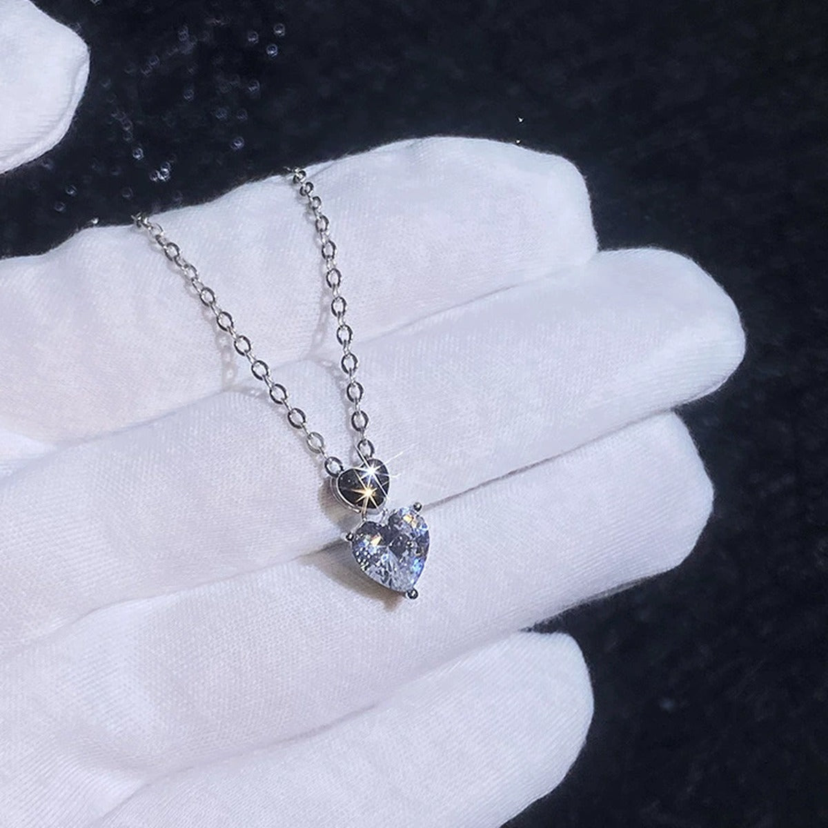 Pear Moissanite Pendant Necklace in Platinum-Plated S925 Sterling Silver dark background product display view