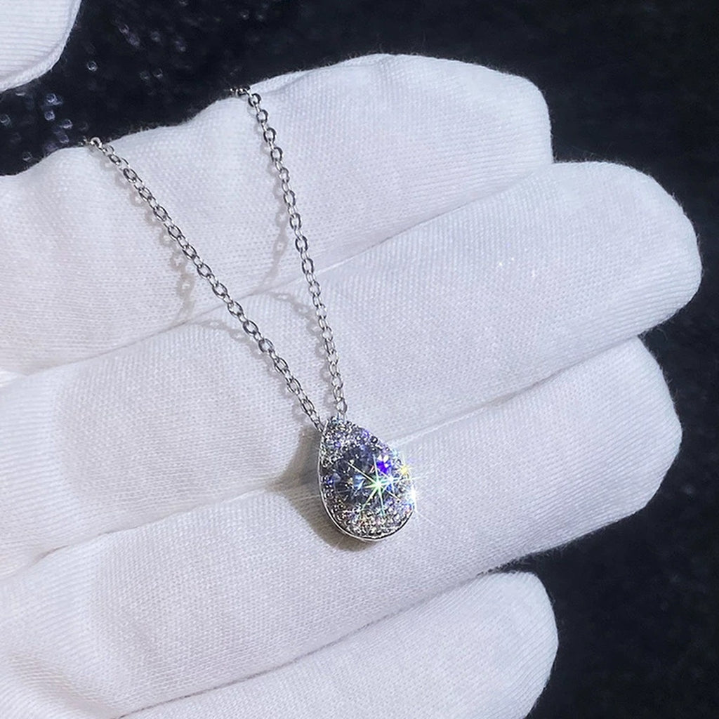 Pear Halo Moissanite Pendant Necklace with Cubic Zirconia in Platinum-Plated S925 Sterling Silver dark background product display view