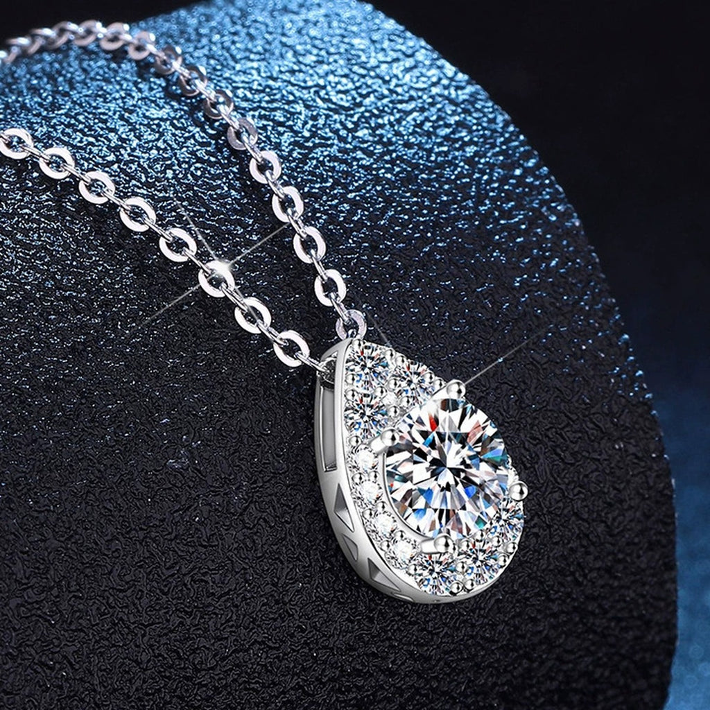 Pear Halo Moissanite Pendant Necklace with Cubic Zirconia in Platinum-Plated S925 Sterling Silver dark background product display view
