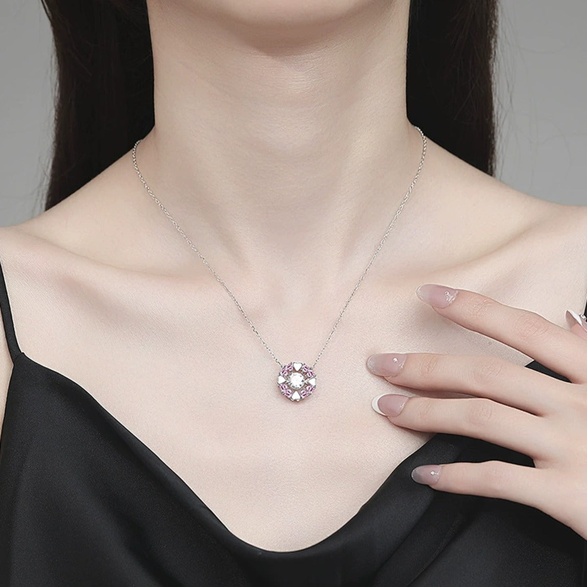Floral Moissanite Pendant Necklace with Pink Cubic Zirconia in Platinum-Plated S925 Sterling Silver worn on neckline by model