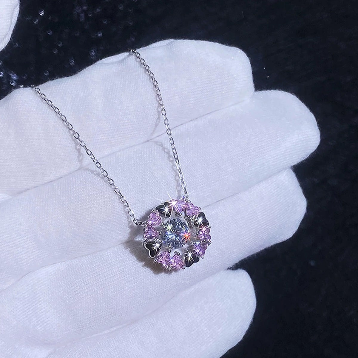 Floral Moissanite Pendant Necklace with Pink Cubic Zirconia in Platinum-Plated S925 Sterling Silver blue background product view
