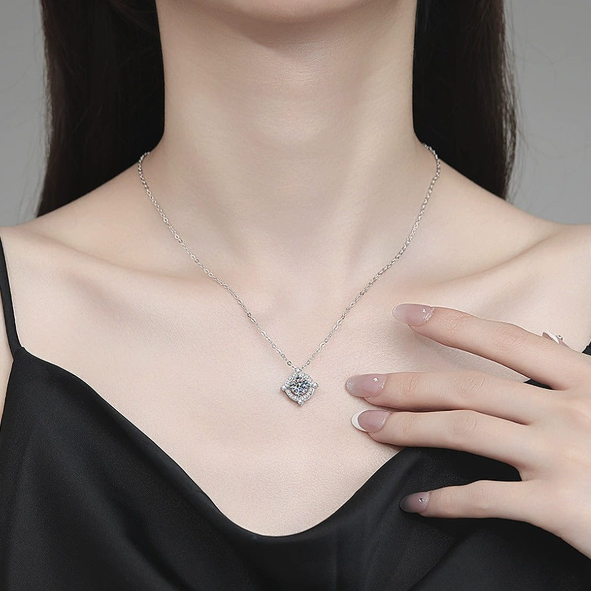 Compass Halo Moissanite Pendant Necklace with Cubic Zirconia in Platinum-Plated S925 Sterling Silver worn on neckline by model