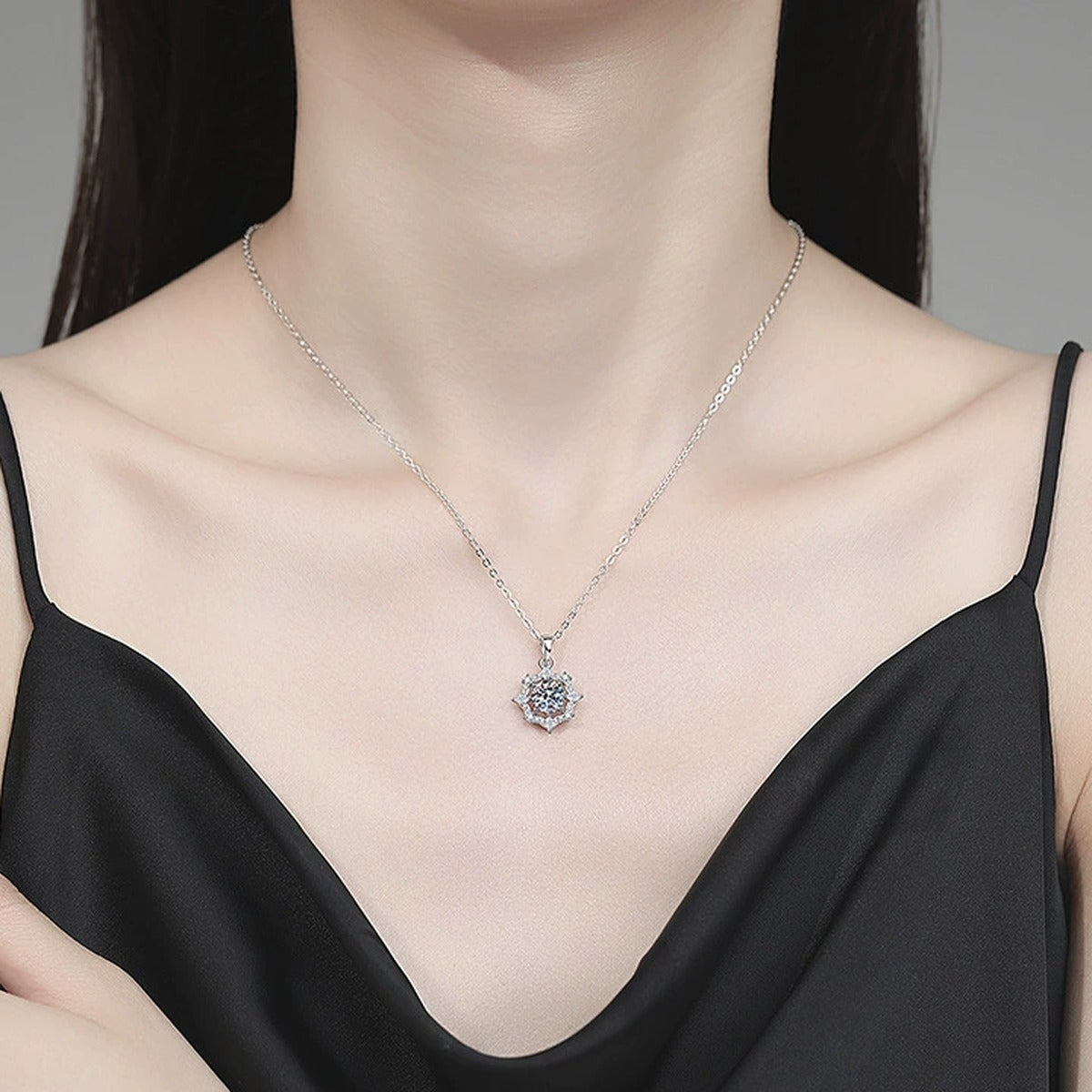 Starburst Moissanite Pendant Necklace with Cubic Zirconia in Platinum-Plated S925 Sterling Silver worn on neckline by model