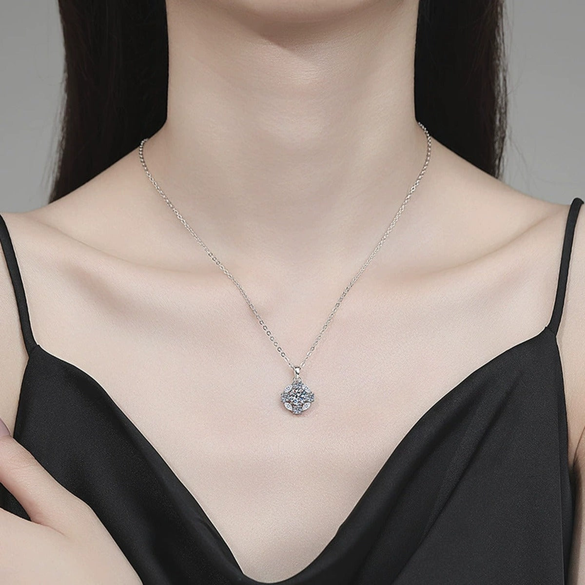 Floral Cluster Moissanite Pendant Necklace with Cubic Zirconia in Platinum-Plated S925 Sterling Silver worn on neckline by model