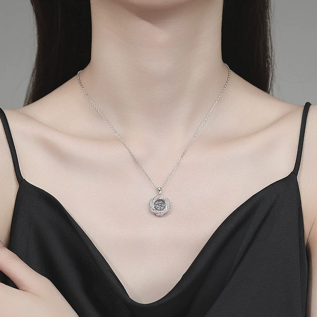 Round Cage Moissanite Pendant Necklace with Cubic Zirconia in Platinum-Plated S925 Sterling Silver worn on neckline by model