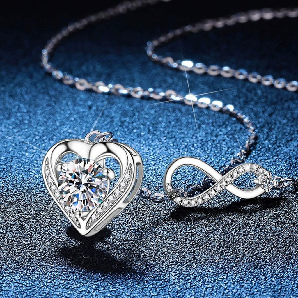 Infinity Heart Moissanite Pendant Necklace with Cubic Zirconia in Platinum-Plated S925 Sterling Silver blue background angled view