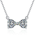 Bow Moissanite Necklace in Platinum-Plated S925 Sterling Silver on clean white background showing the bow-shaped necklace formed by two moissanite stones