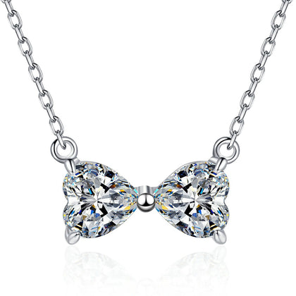 Bow Moissanite Necklace in Platinum-Plated S925 Sterling Silver on clean white background showing the bow-shaped necklace formed by two moissanite stones