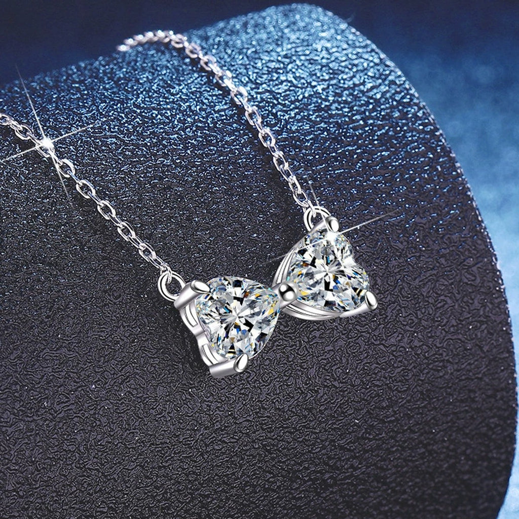 Bow Moissanite Necklace in Platinum-Plated S925 Sterling Silver blue background product view