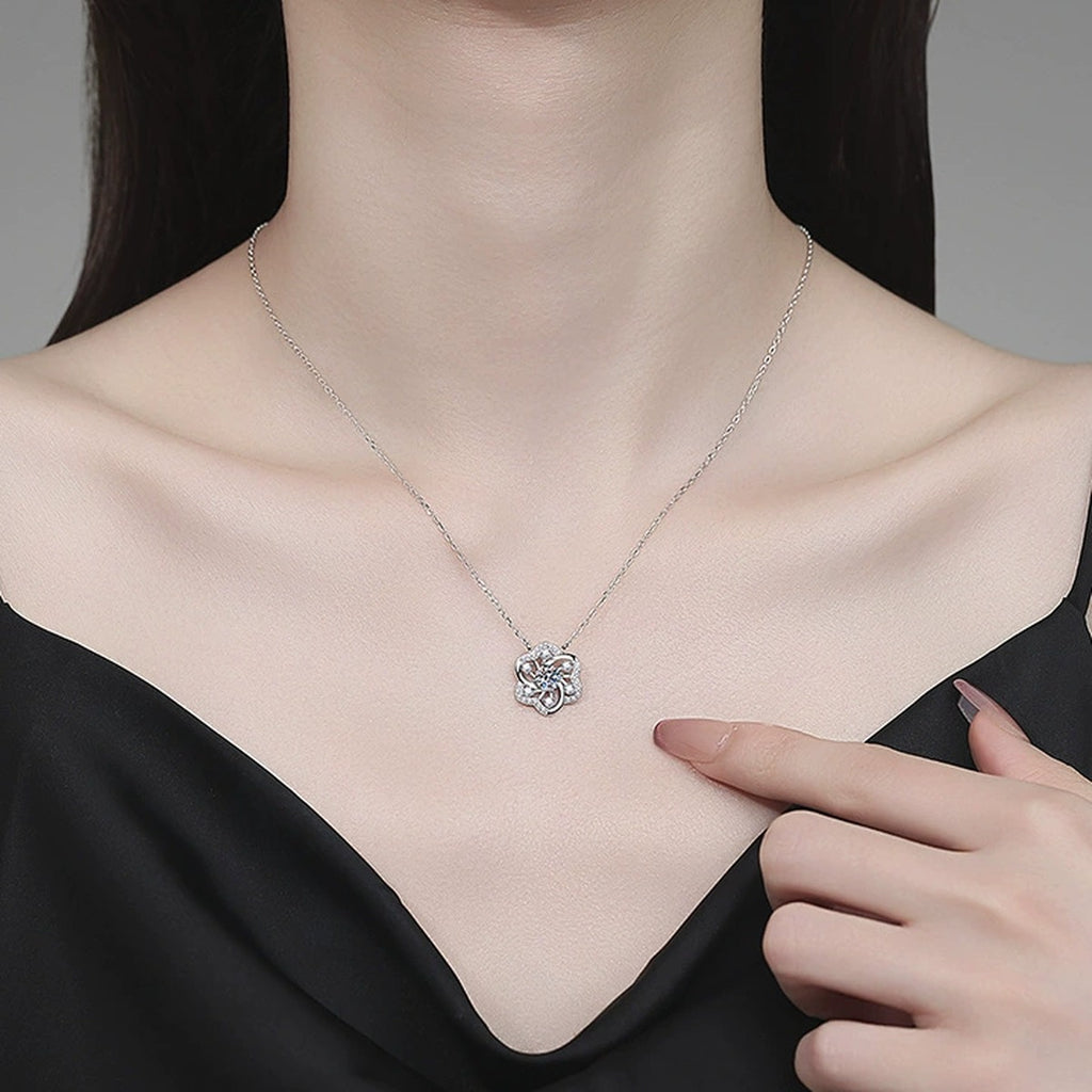 Clover Moissanite Pendant Necklace with Cubic Zirconia in Platinum-Plated S925 Sterling Silver worn on neckline by model