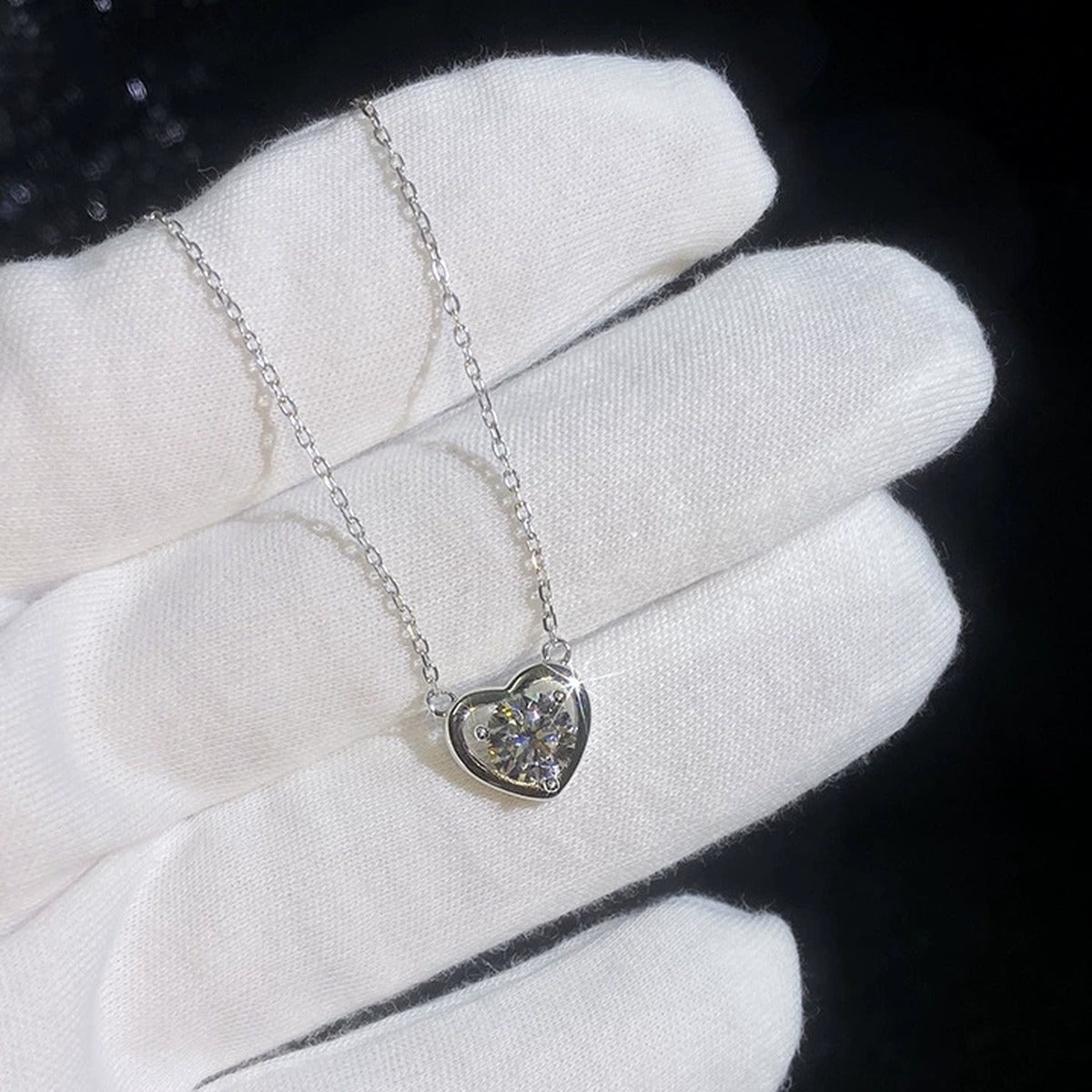 Heart Moissanite Pendant Necklace in Platinum-Plated S925 Sterling Silver dark background product display view