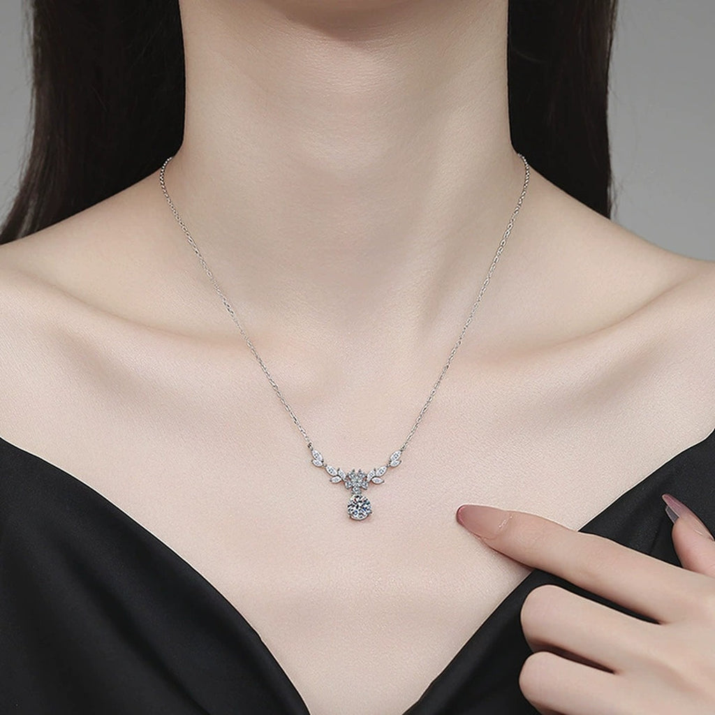 Leaf Drop Moissanite Pendant Necklace with Cubic Zirconia in Platinum-Plated S925 Sterling Silver worn on neckline by model