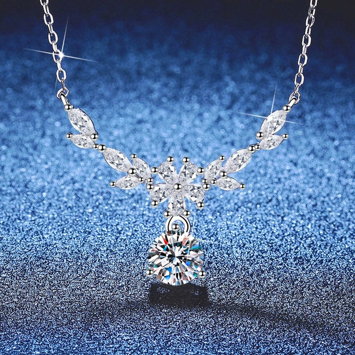 Leaf Drop Moissanite Pendant Necklace with Cubic Zirconia in Platinum-Plated S925 Sterling Silver blue background product view