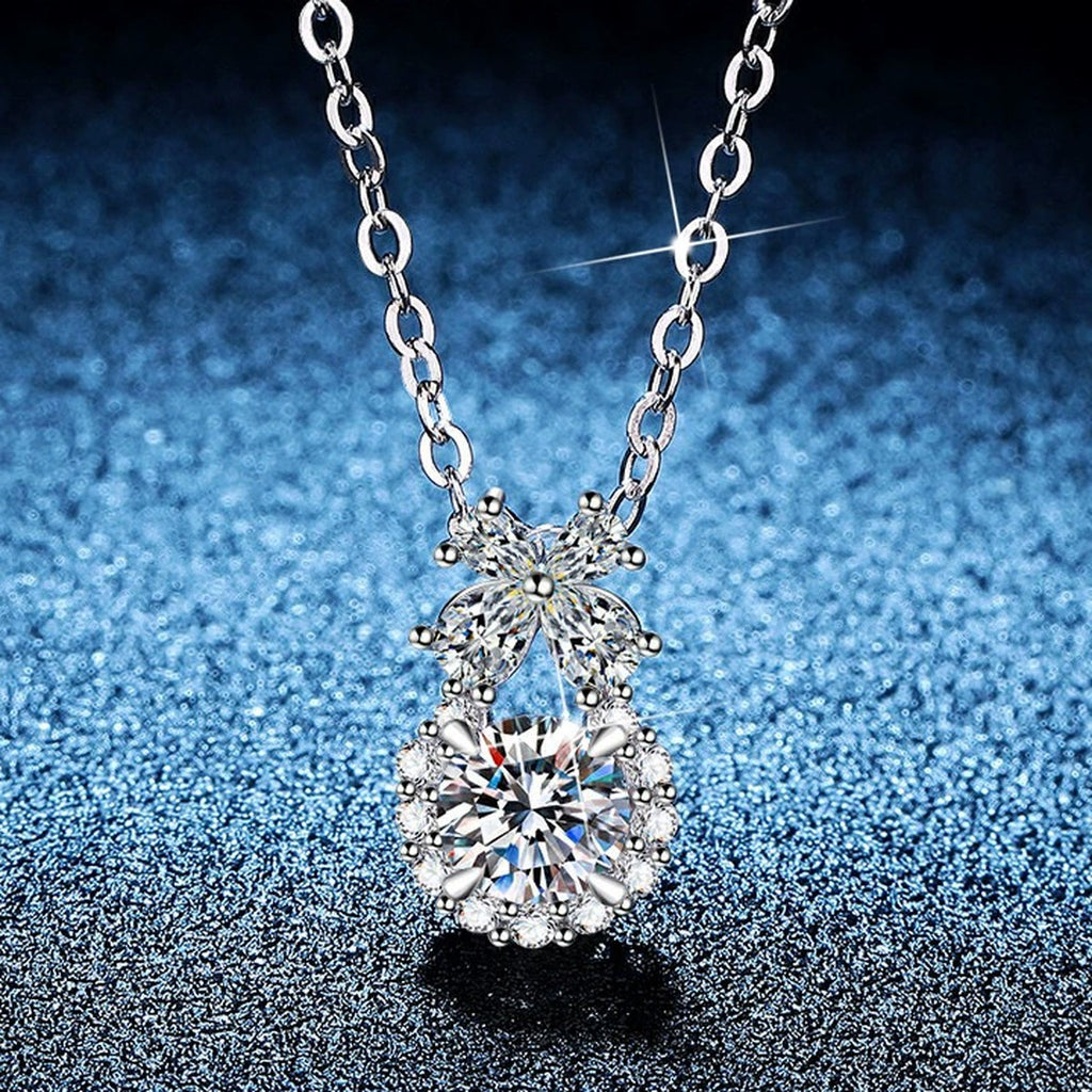 Bow Drop Moissanite Pendant Necklace with Cubic Zirconia in Platinum-Plated S925 Sterling Silver blue background product view
