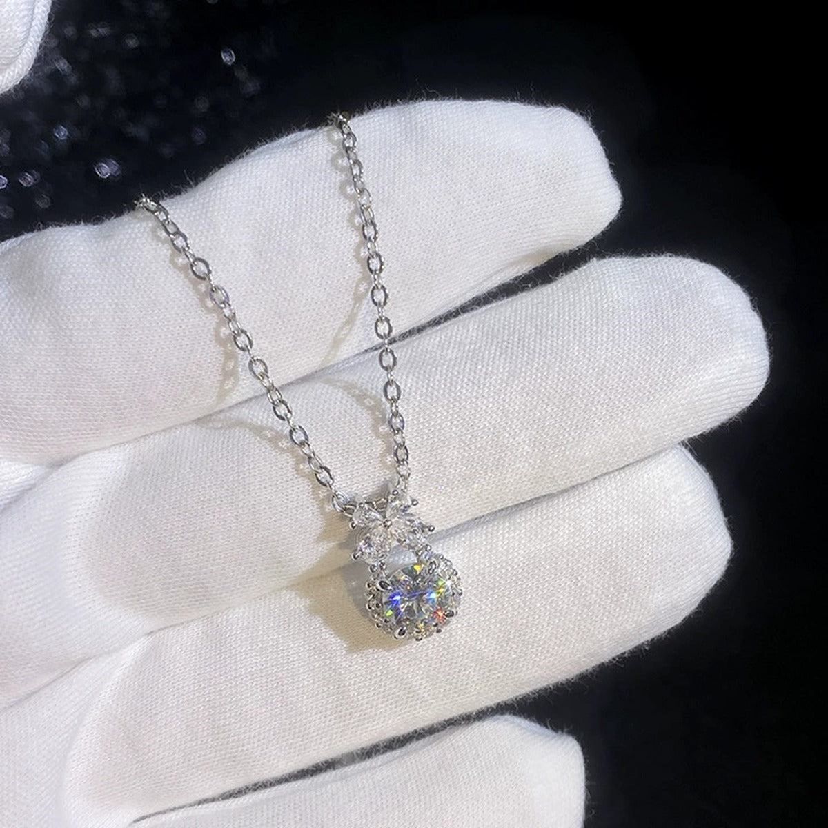 Bow Drop Moissanite Pendant Necklace with Cubic Zirconia in Platinum-Plated S925 Sterling Silver dark background product display view