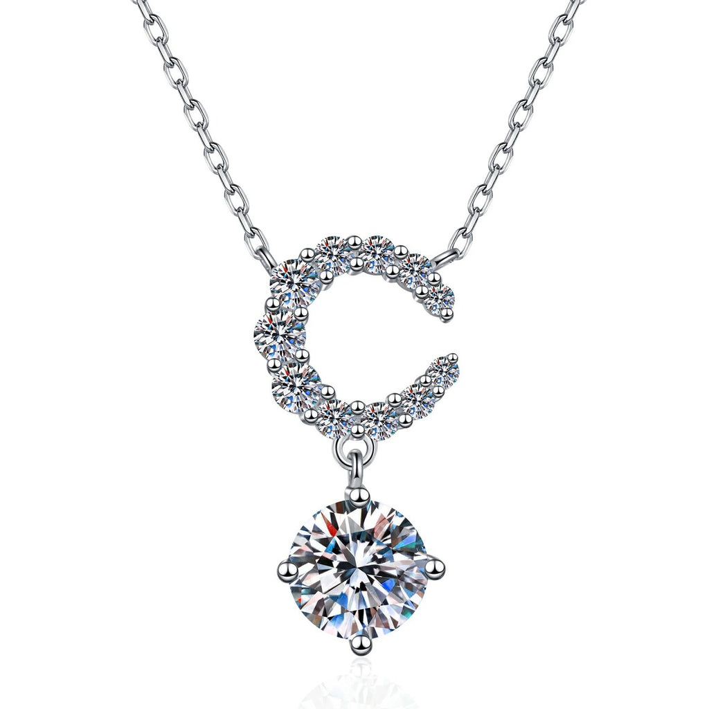 Crescent Moon Moissanite Pendant Necklace with Cubic Zirconia in Platinum-Plated S925 Sterling Silver on clean white background showing the crescent moon pendant above a round moissanite drop