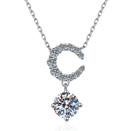 Crescent Moon Moissanite Pendant Necklace with Cubic Zirconia in Platinum-Plated S925 Sterling Silver on clean white background showing the crescent moon pendant above a round moissanite drop