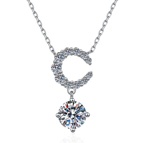 Crescent Moon Moissanite Pendant Necklace with Cubic Zirconia in Platinum-Plated S925 Sterling Silver on clean white background showing the crescent moon pendant above a round moissanite drop