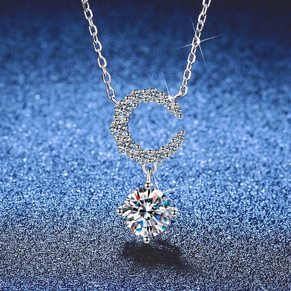 Crescent Moon Moissanite Pendant Necklace with Cubic Zirconia in Platinum-Plated S925 Sterling Silver blue background product view