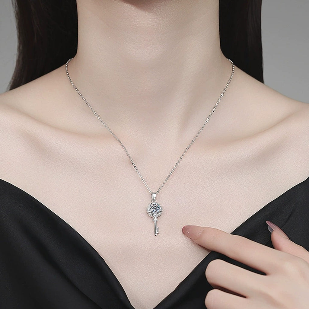 Key Moissanite Pendant Necklace with Cubic Zirconia in Platinum-Plated S925 Sterling Silver worn on neckline by model
