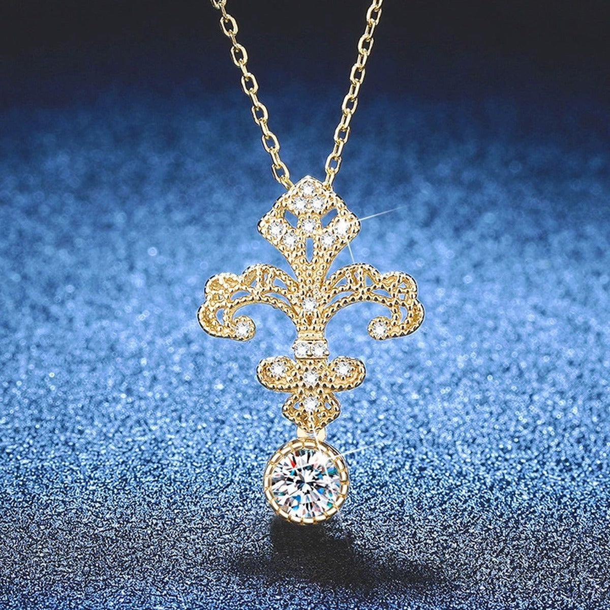 Fleur-de-Lis Moissanite Pendant Necklace with Cubic Zirconia in 18K Yellow Gold-Plated S925 Sterling Silver blue background angled view