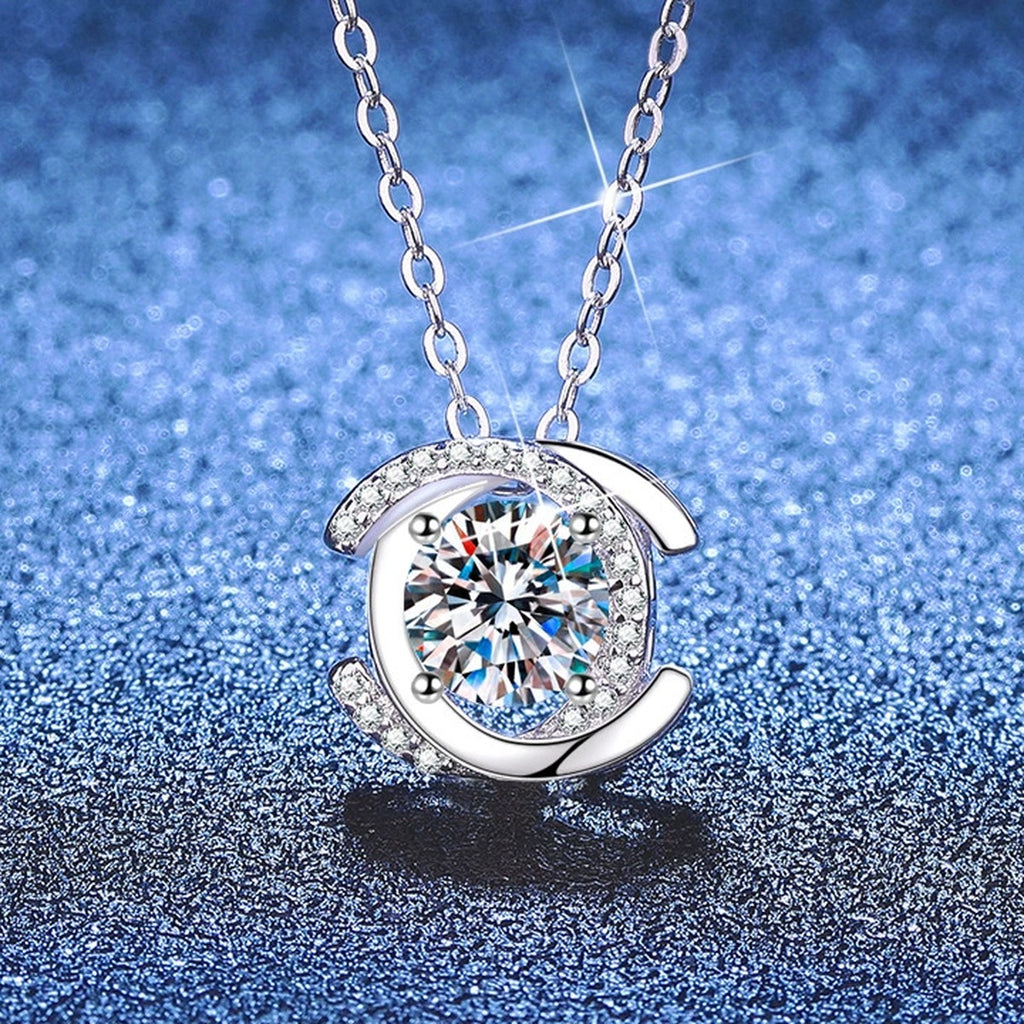 Circle Halo Moissanite Pendant Necklace with Cubic Zirconia in Platinum-Plated S925 Sterling Silver blue background angled view