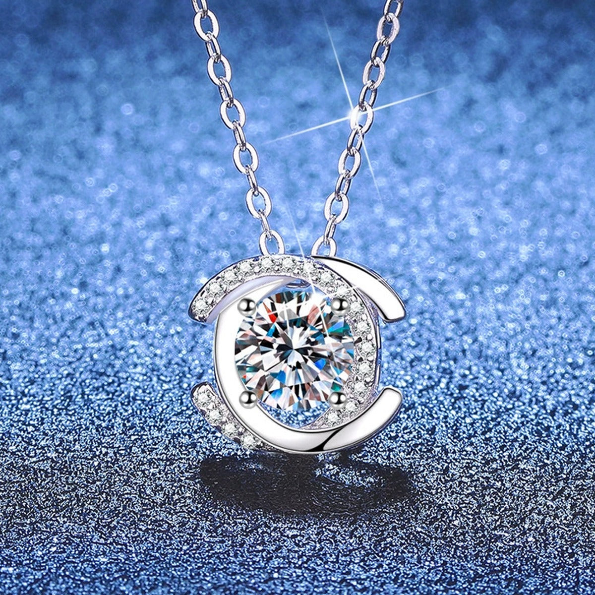 Circle Halo Moissanite Pendant Necklace with Cubic Zirconia in Platinum-Plated S925 Sterling Silver blue background angled view