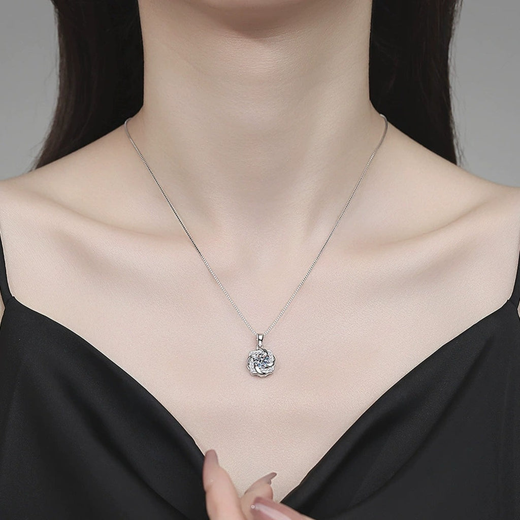 Floral Swirl Moissanite Pendant Necklace with Cubic Zirconia in Platinum-Plated S925 Sterling Silver worn on neckline by model