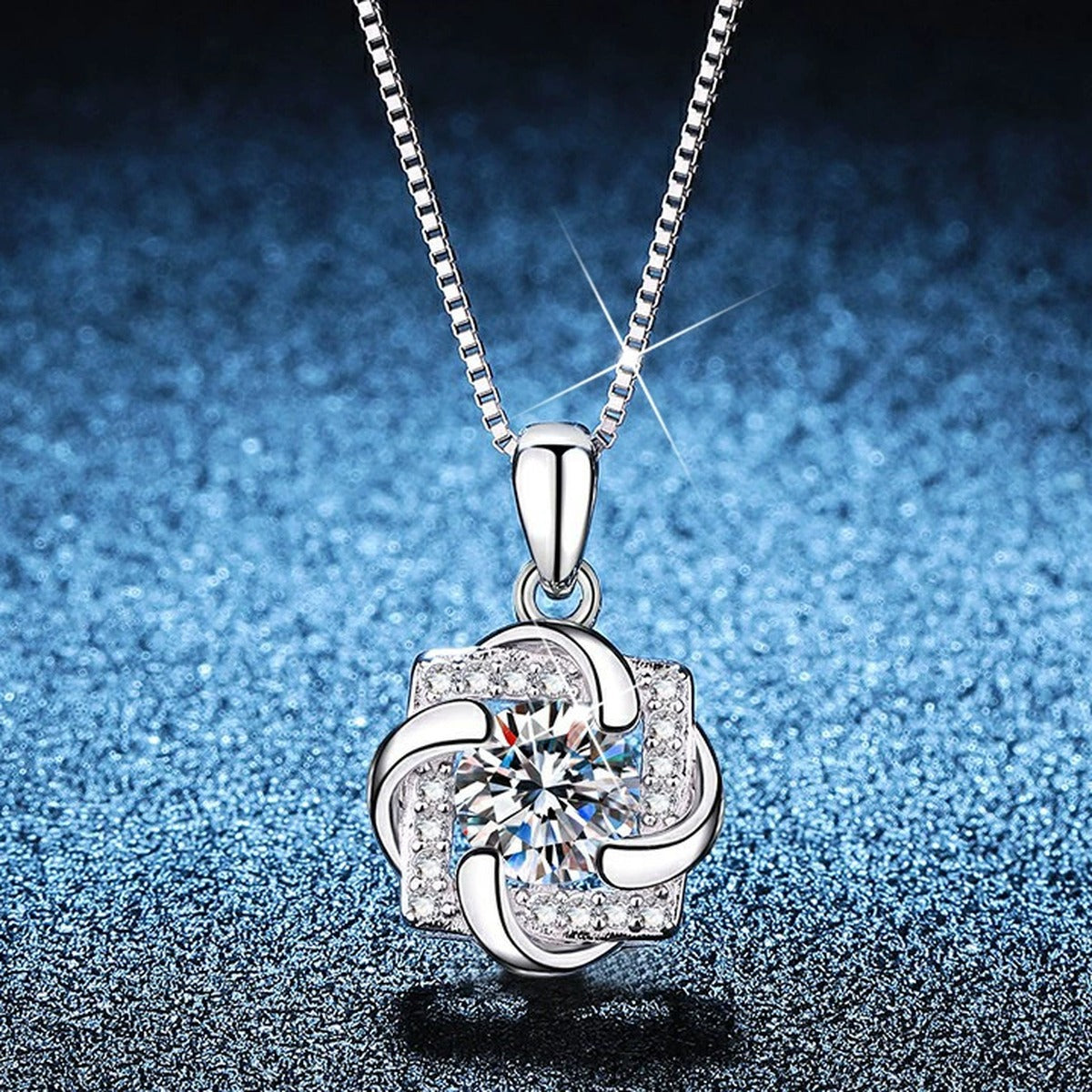 Floral Swirl Moissanite Pendant Necklace with Cubic Zirconia in Platinum-Plated S925 Sterling Silver blue background product view
